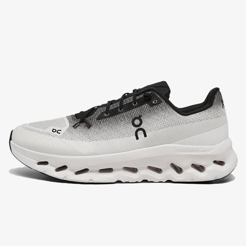 men's cloudtilt sneaker - Men's black and ivory Cloudtilt sneaker with engineered mesh and a cushioned midsole.