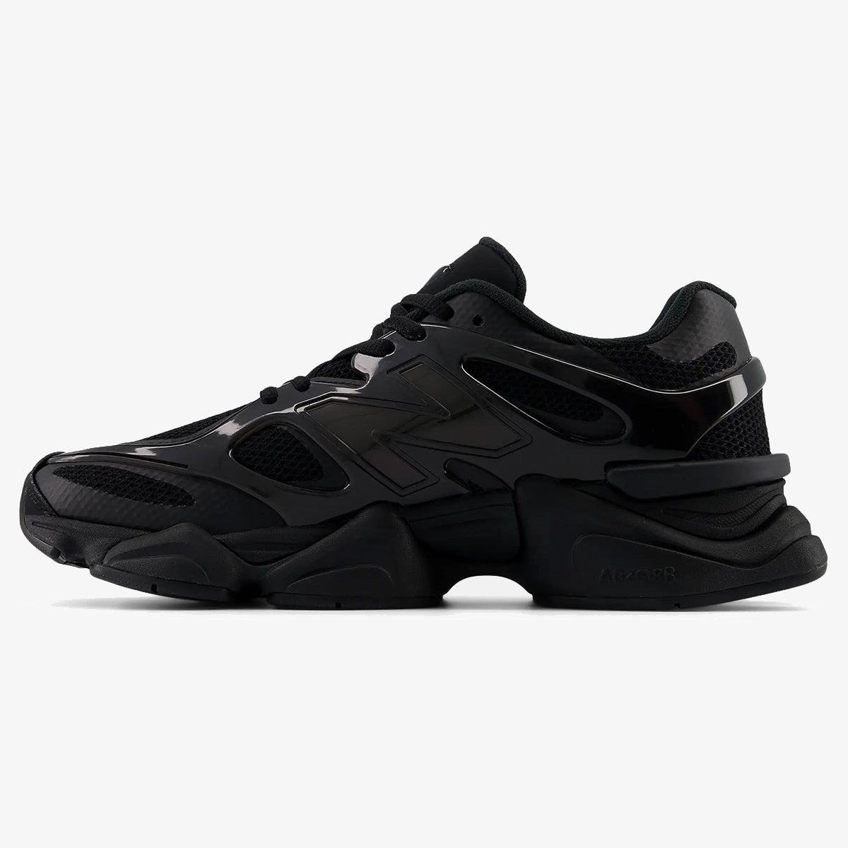 NB 9060 Caged Black Cat sneaker with black TPU cage overlay and chunky sole