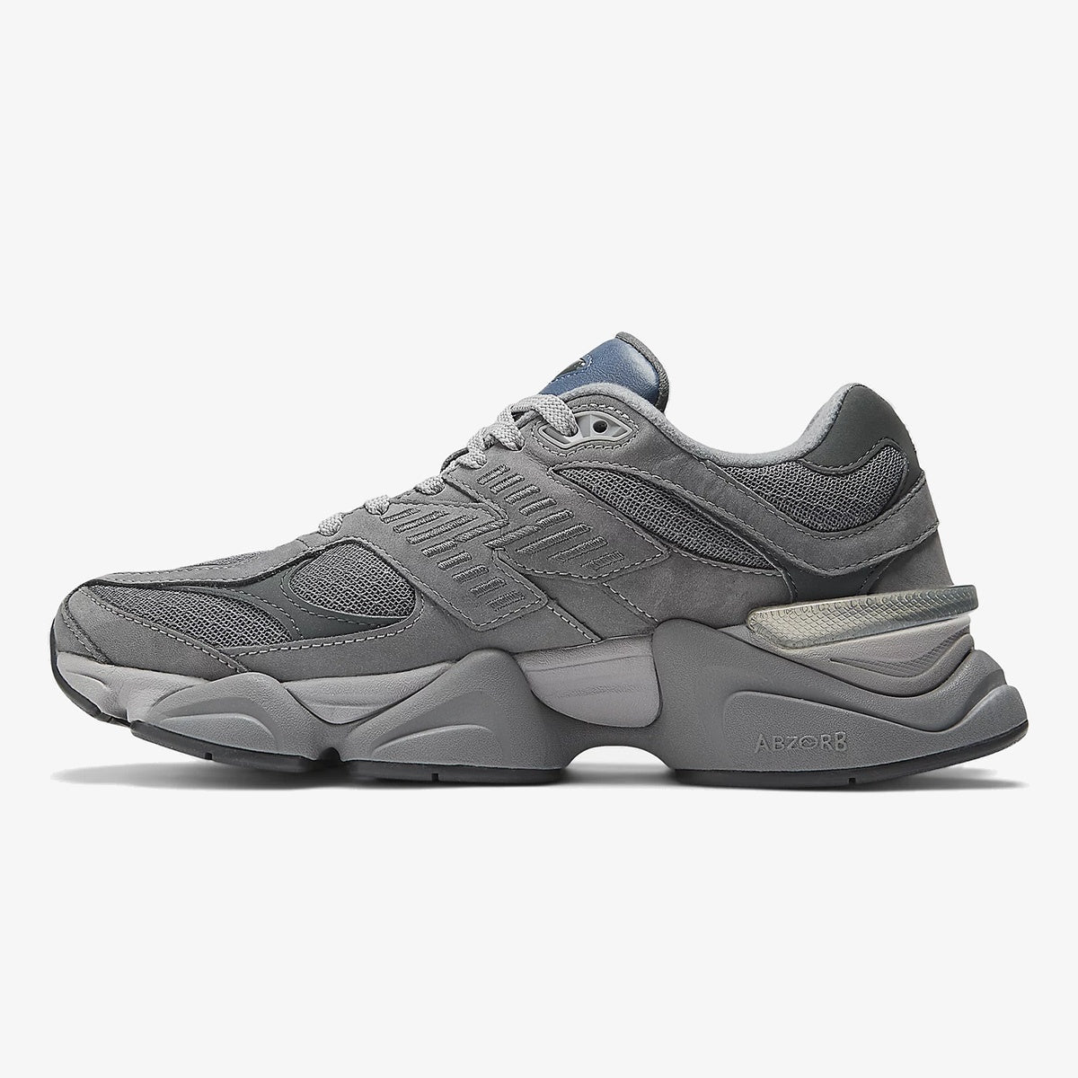 nb 9060 castlerock - New Balance Castlerock sneaker with layered grey mesh, navy accents, and sculpted sole