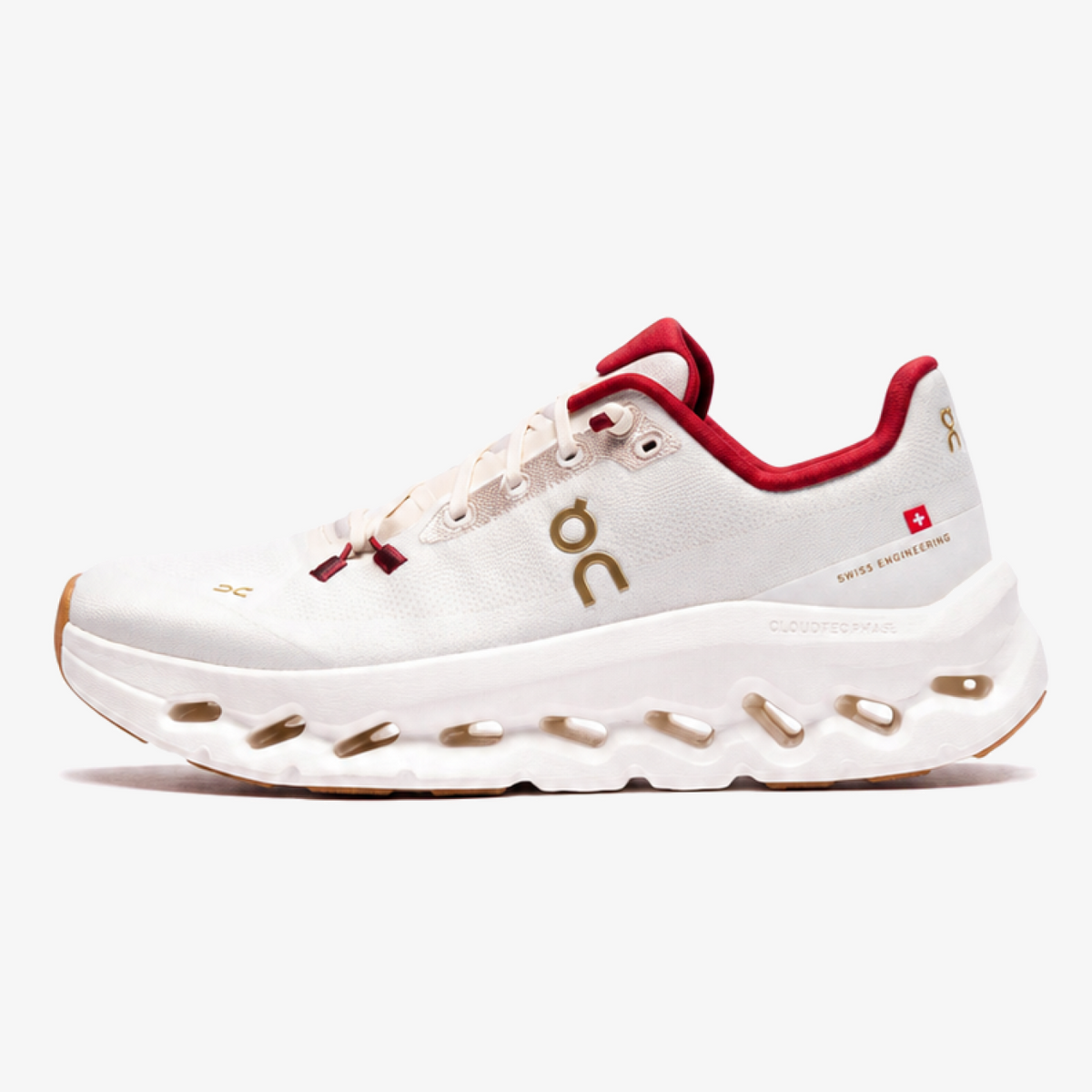 women's on cloudtilt - Women's Pearl and Ivory ON Cloudtilt with tactile snake-inspired detailing, gold accents, and a sculpted cushioned sole.